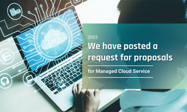 A user with a laptop with a cloud image onscreen, managed cloud services RFP posted language