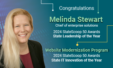 Melinda Stewart, winning an award for Web Modernization Project